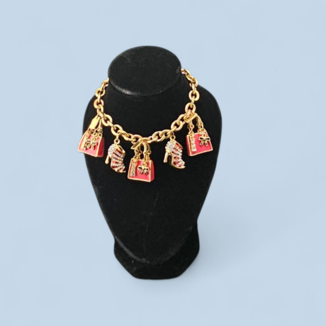 Gold/Pink charm bracelet